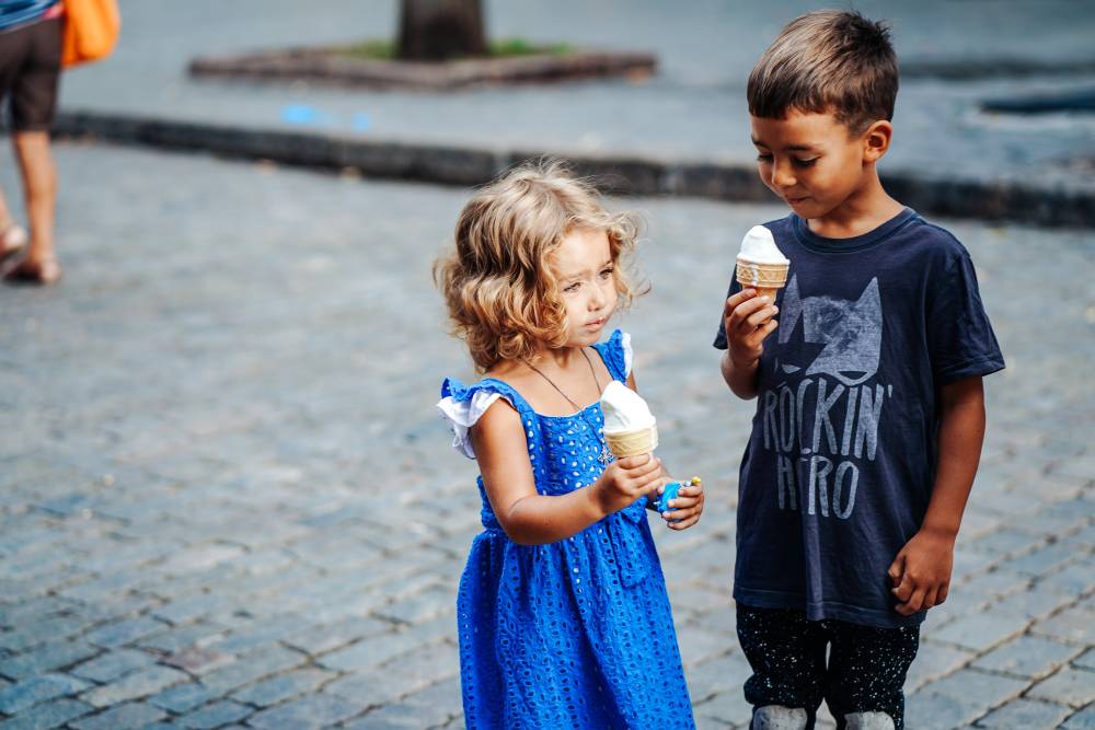 Little boy and little girl with ice cream