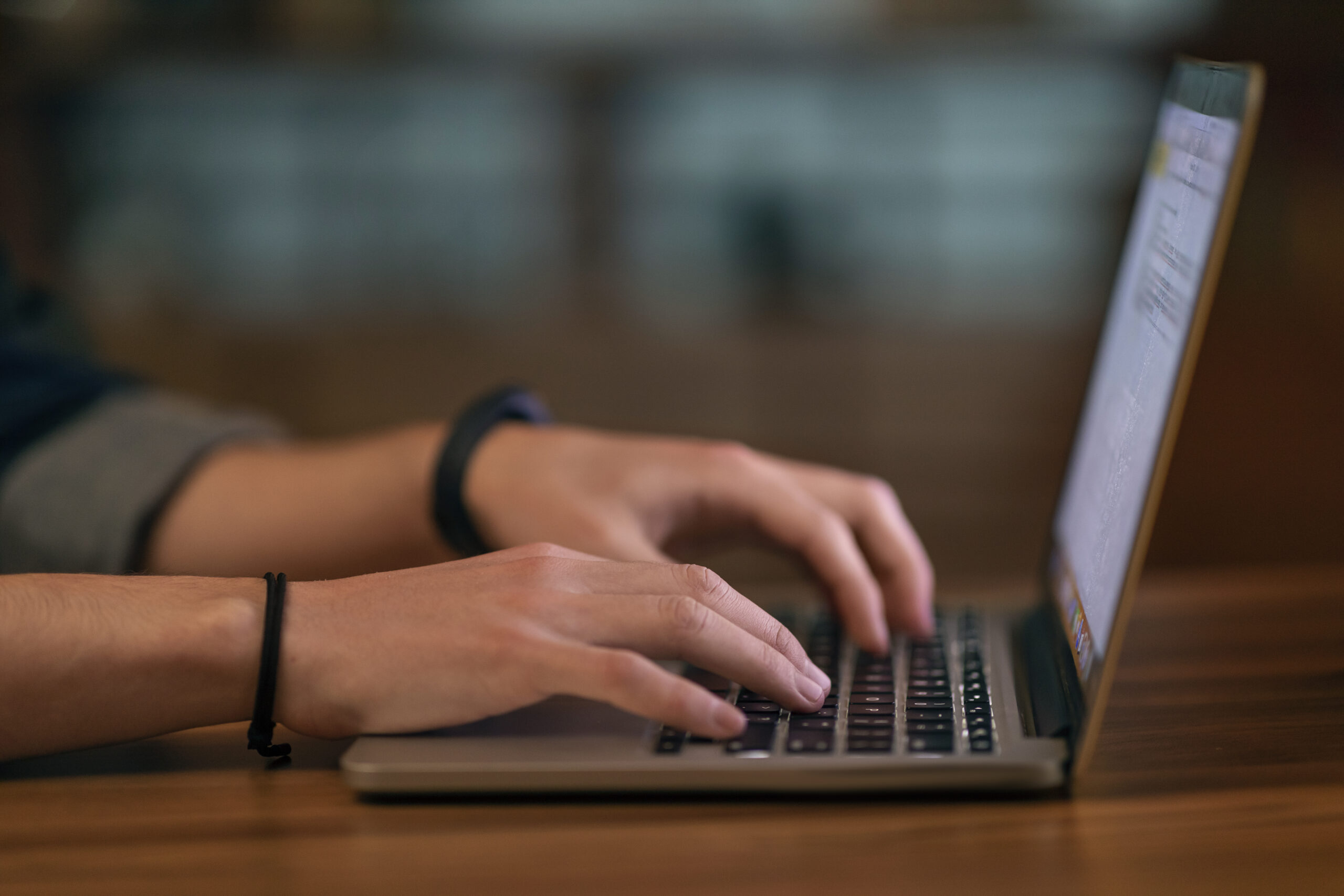 Person reviewing appointment options on a government website using a laptop
