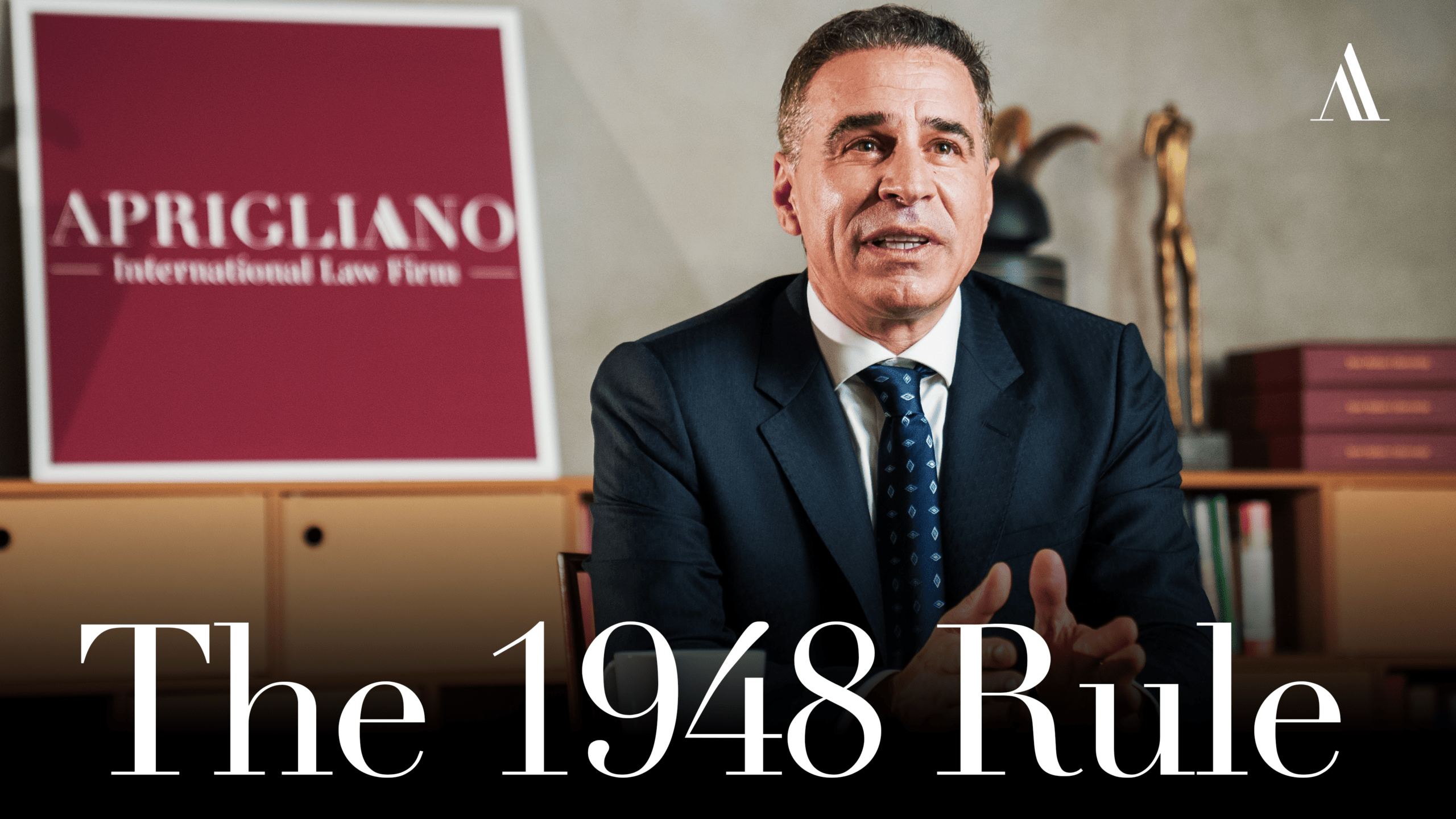 Avv. Salvatore Aprigliano, Italian citizenship lawyer, discussing the 1948 Rule in his Milan office — Aprigliano International Law Firm