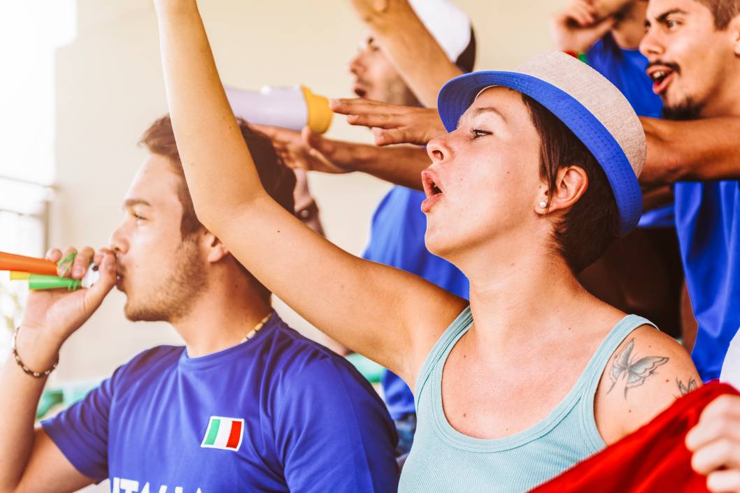 Supporters from Italy at stadium watching the match