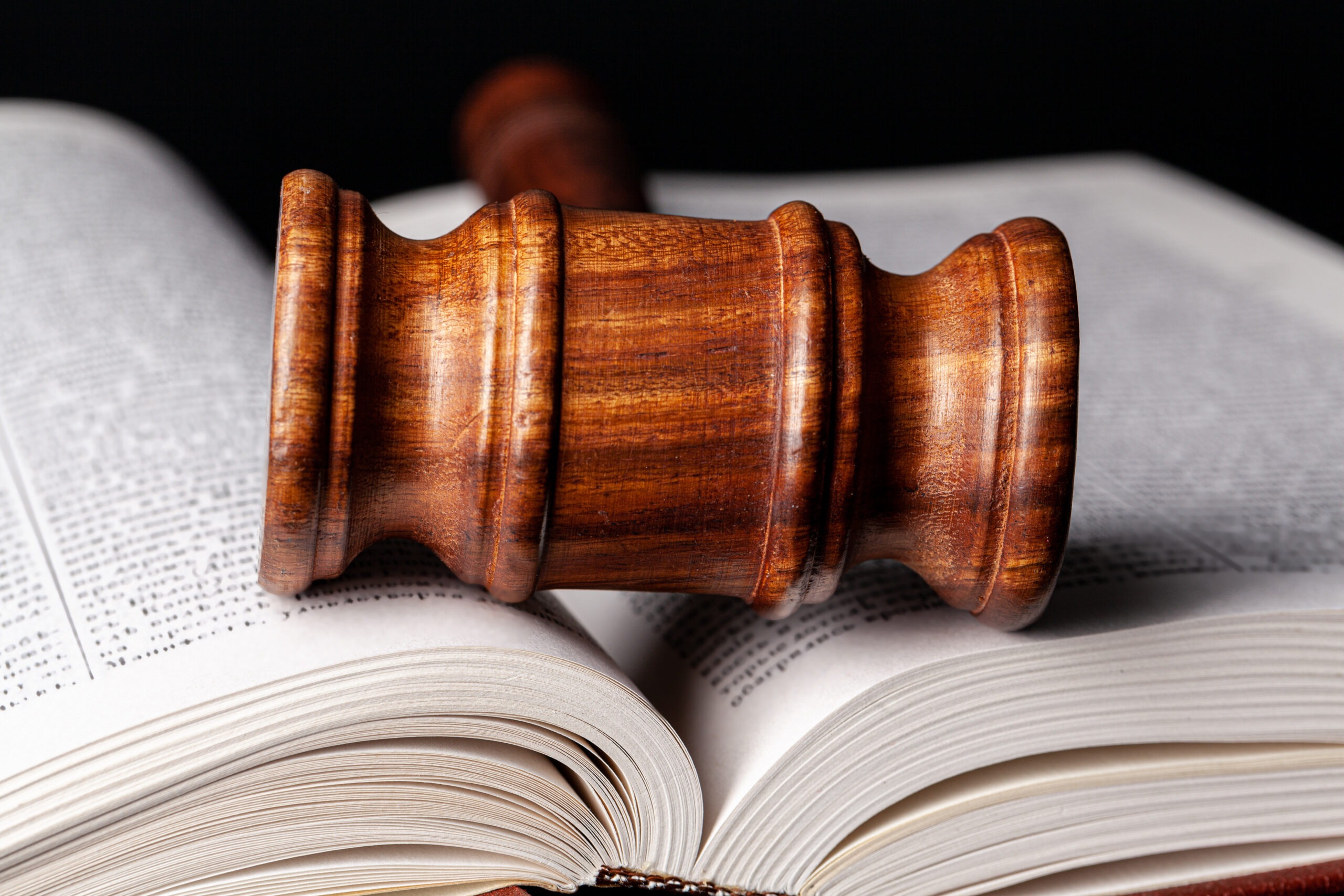 Judicial gavel on legal text representing Italian law requirements for validating a power of attorney